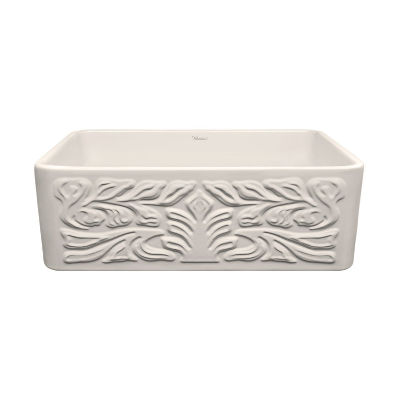 Whitehaus Farmhaus Fireclay Reversible Sink with a Gothichaus Swirl Design Front Apron on One Side, and a Fluted Front Apron on the Opposite Side.