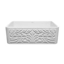 Whitehaus Farmhaus Fireclay Reversible Sink with a Gothichaus Swirl Design Front Apron on One Side, and a Fluted Front Apron on the Opposite Side.